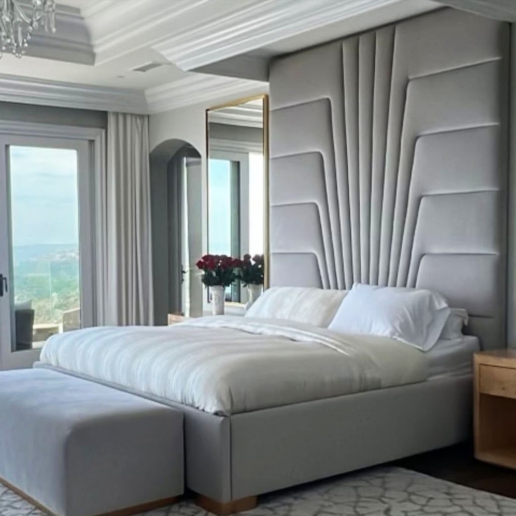 Tall sculpted headboard bed in light gray fabric, custom-designed by Solo Home Decor for luxury interiors.