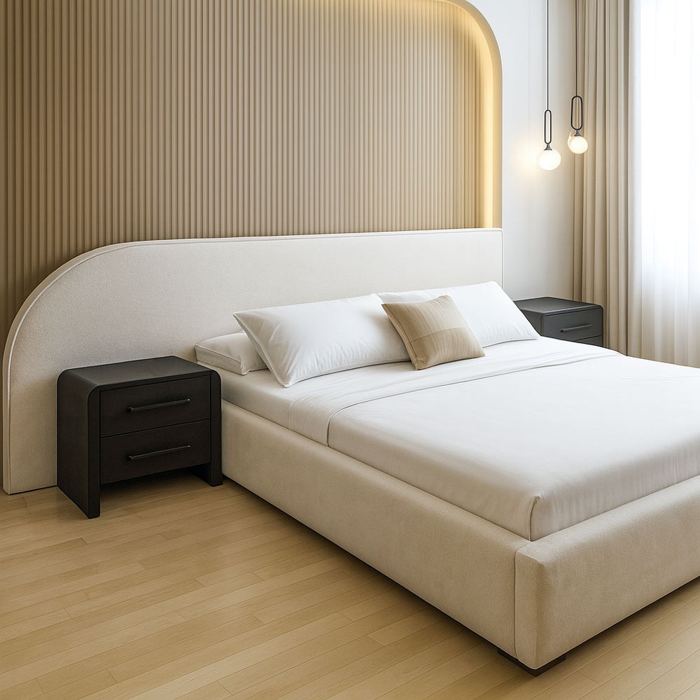 Custom wide headboard extending past nightstands behind a neatly made bed, styled with soft textures by solo home decor