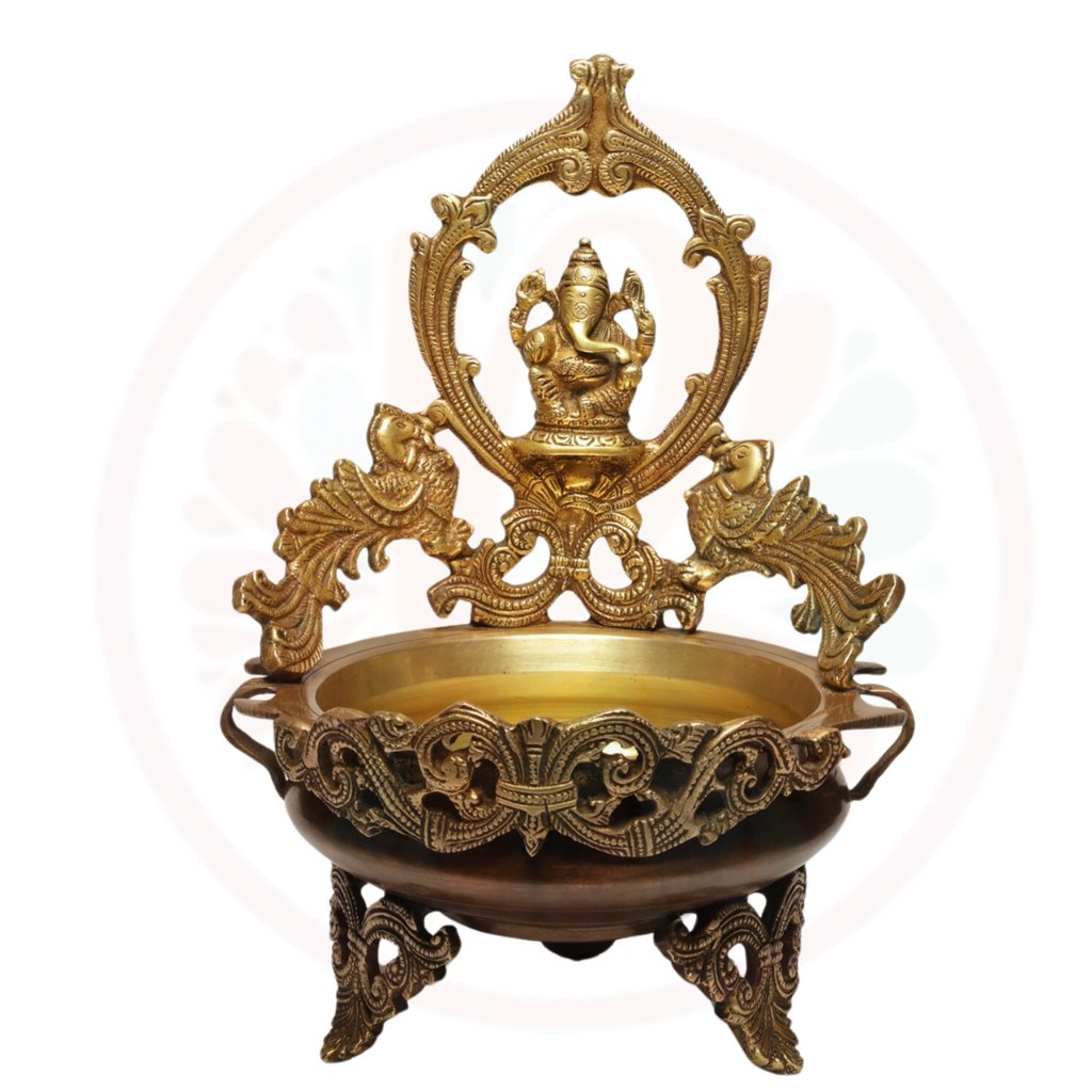 a gold plated bowl with a gan ganesh ganesh statue