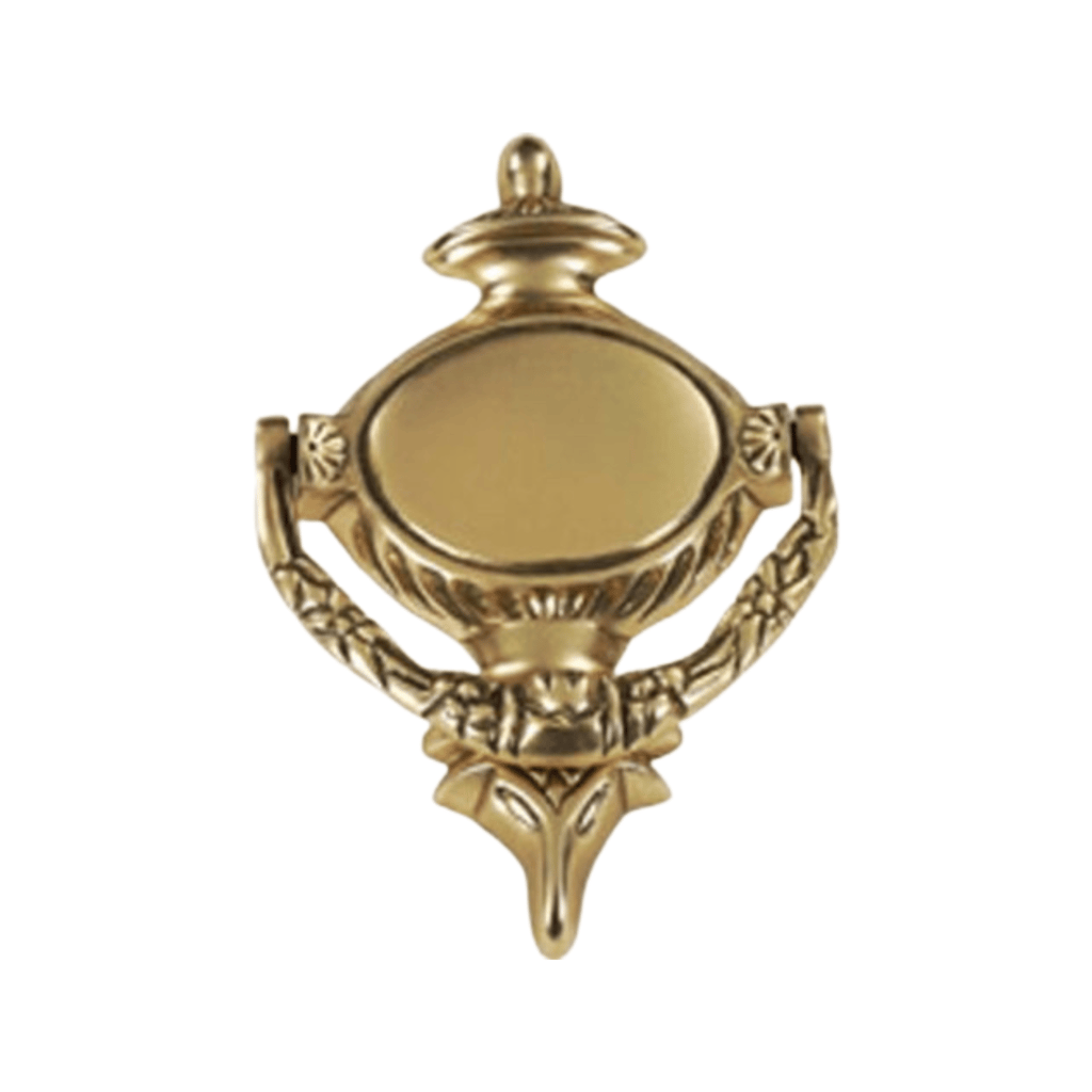 a gold colored metal object with a gold colored frame