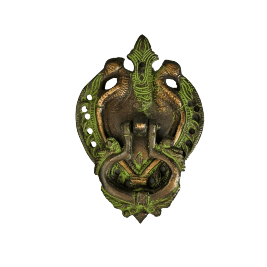 a metal wall mounted with a green dragonfly