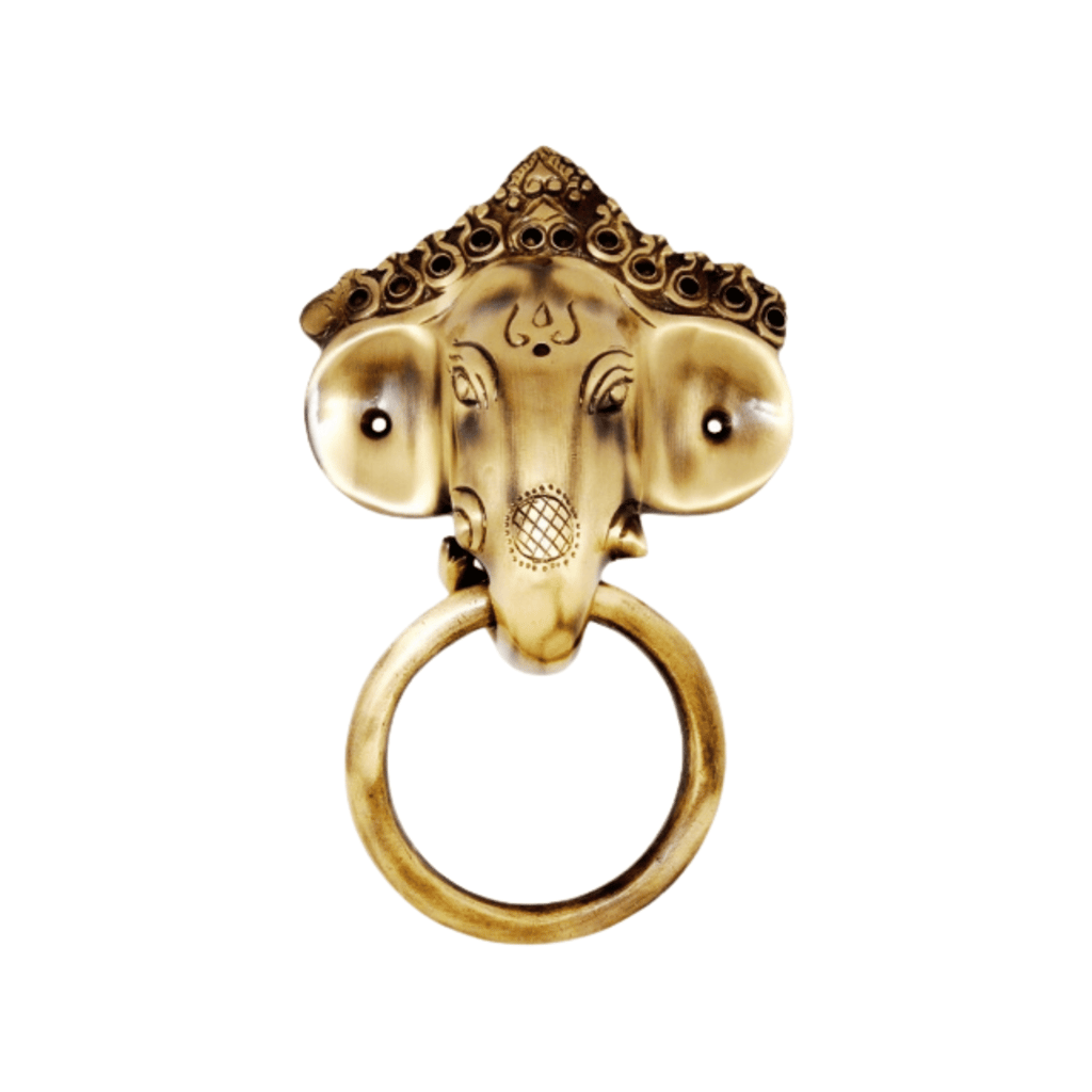a gold ring with a head of an elephant