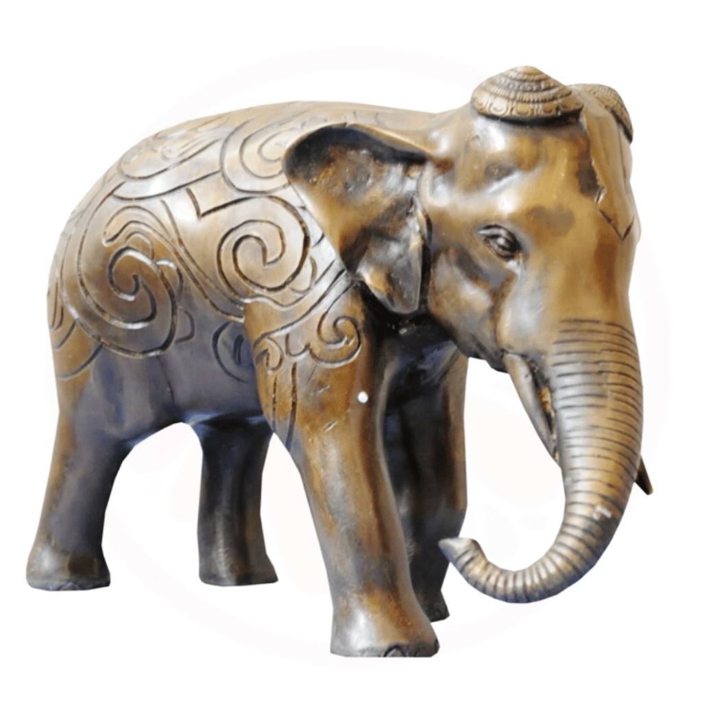 a statue of an elephant with a hat on