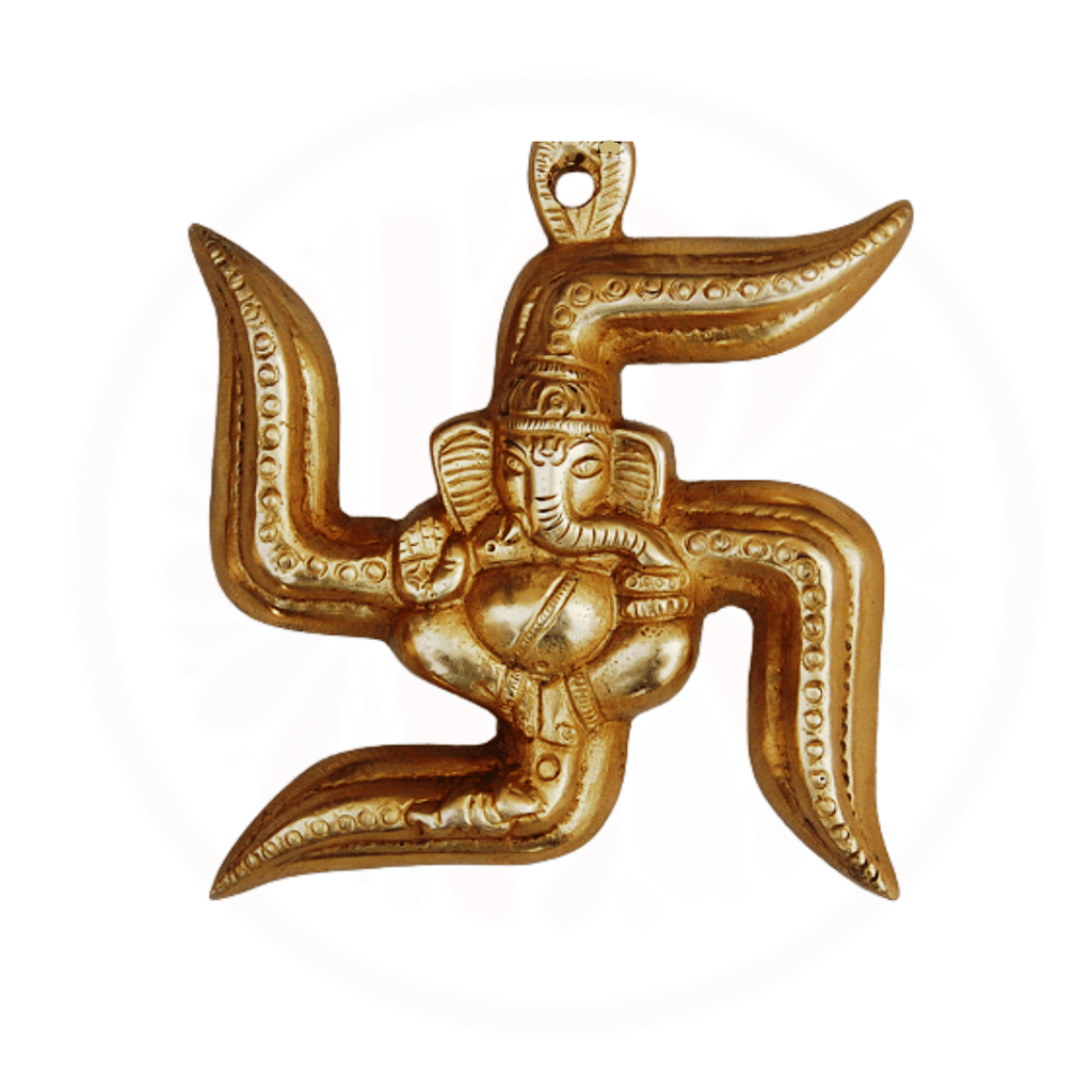 a gold colored pendant with a large gold colored figure