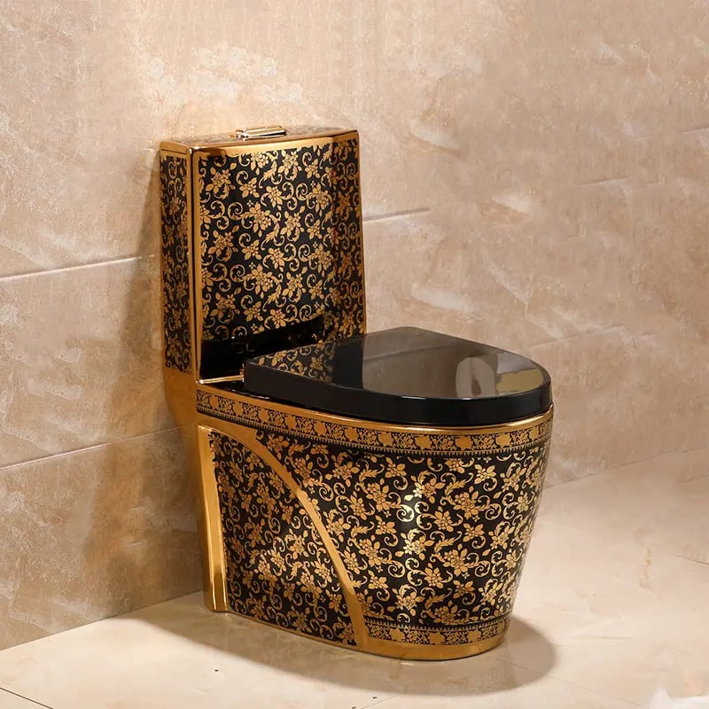 a toilet with a black and gold toilet seat cover