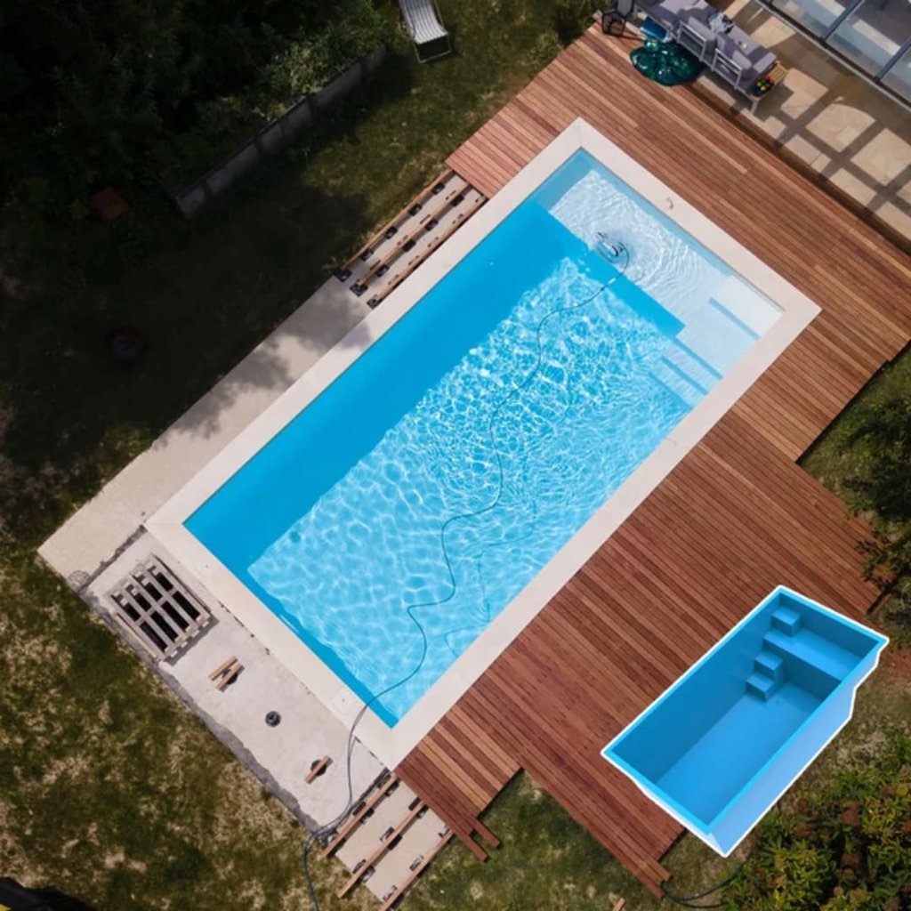 a pool with a wooden deck and a pool