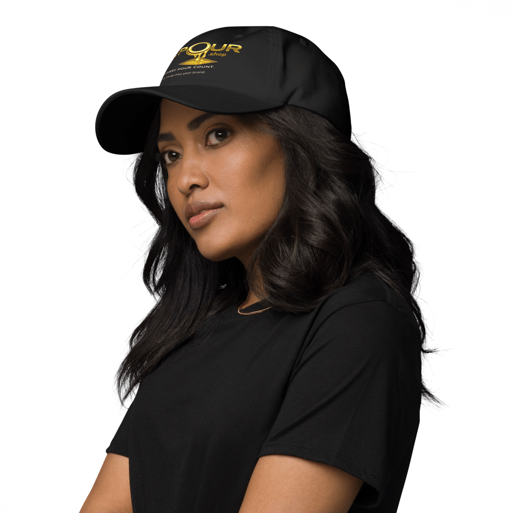 woman wearing the pour shop logo black cap portrait