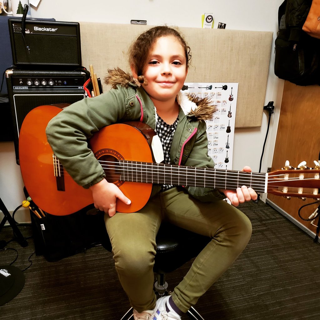 Happy guitar student