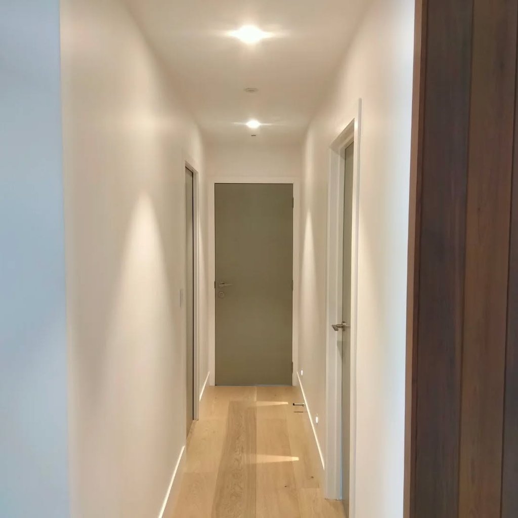 Interior painting project hallway doors - Precision Paint