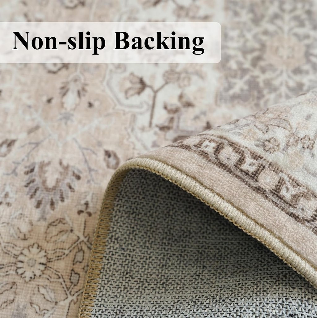 Close-up of a vintage floral area rug with a non-slip backing corner folded over.