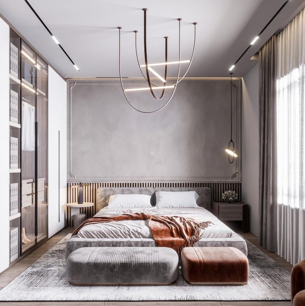 a bedroom with a bed and a couch Nour Nagy Designs