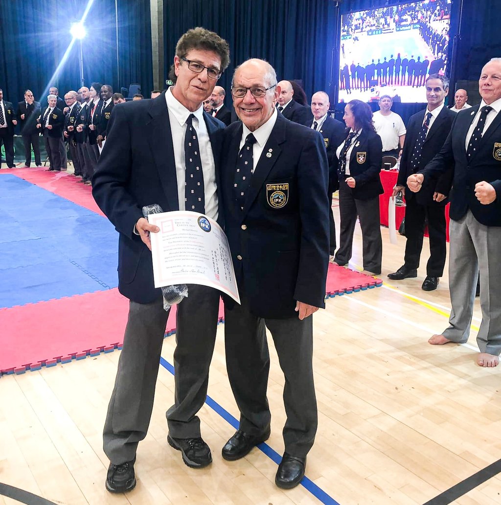 Shihan Michael Monaco receives 8th Dan from Hanshi Steve Arneil at 2019 BKK Open