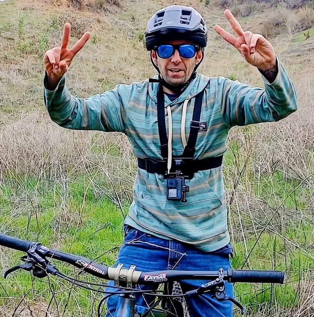 mountain biker wearing sunglasses for eye protection