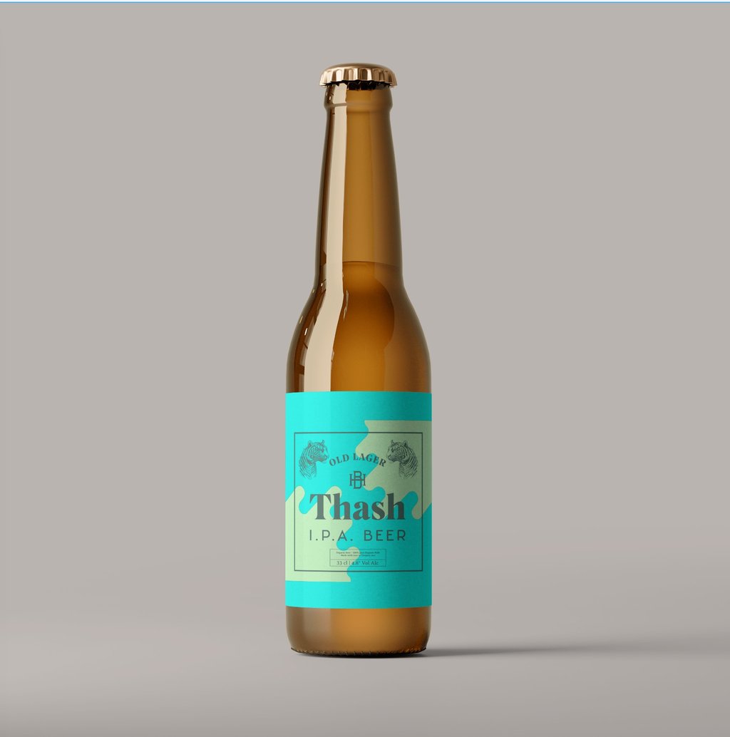 a bottle of beer that is sitting on a table