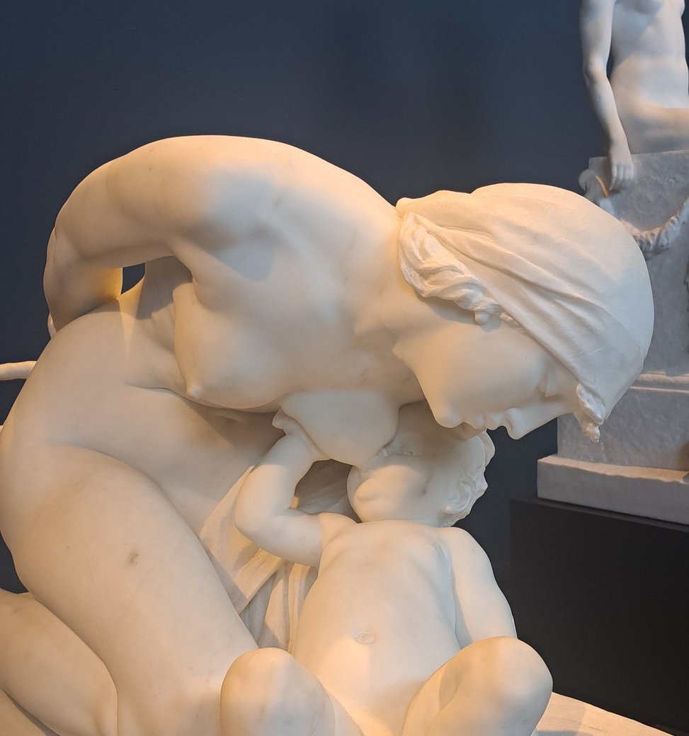 woman nursing a baby