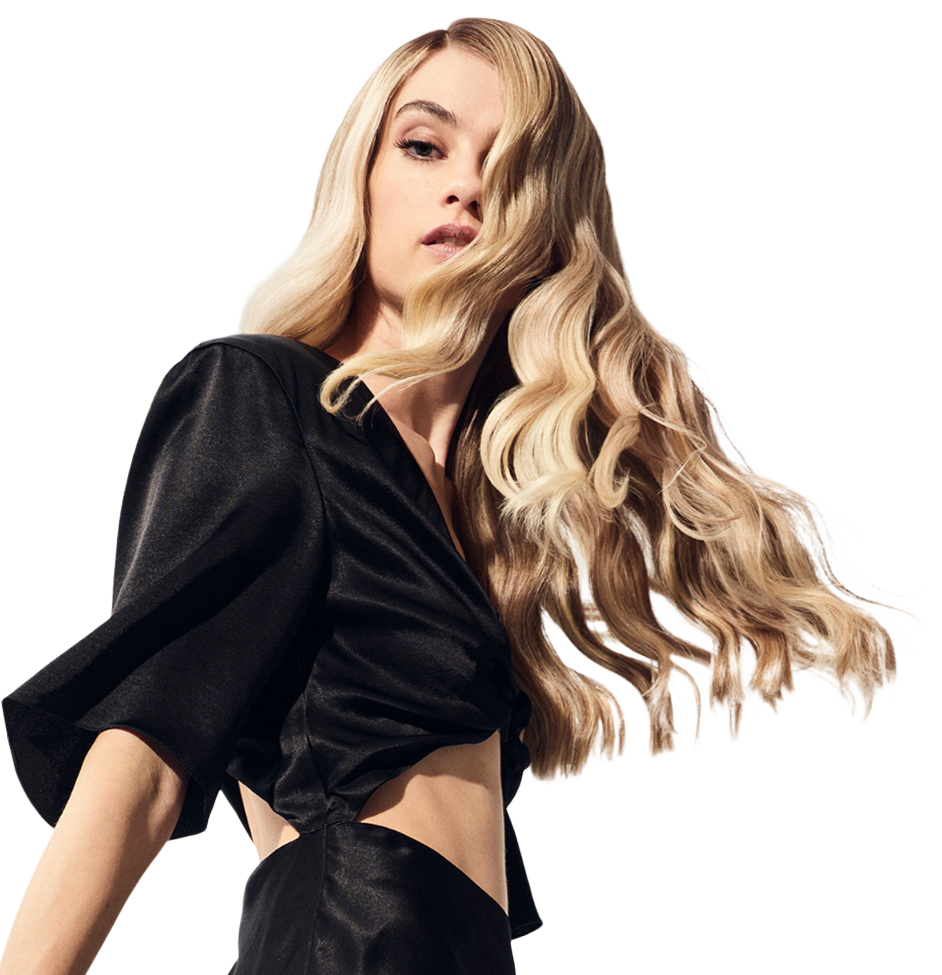 Woman with smooth, shiny hair after keratin treatment.