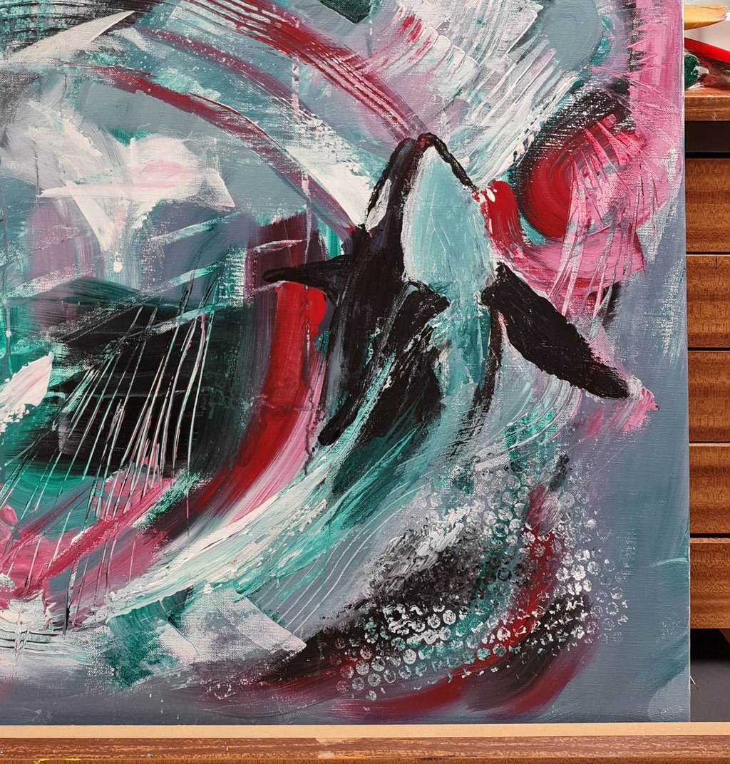 Abstract acrylic painting featuring expressive teal, red, and black brushstrokes on canvas.