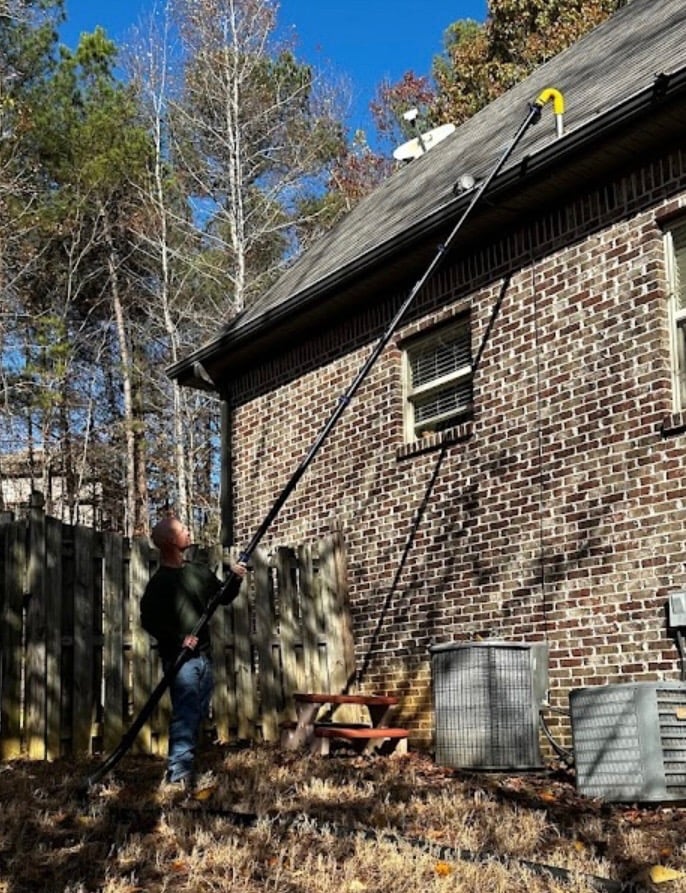 Residential gutter cleaning with gutter pro vac