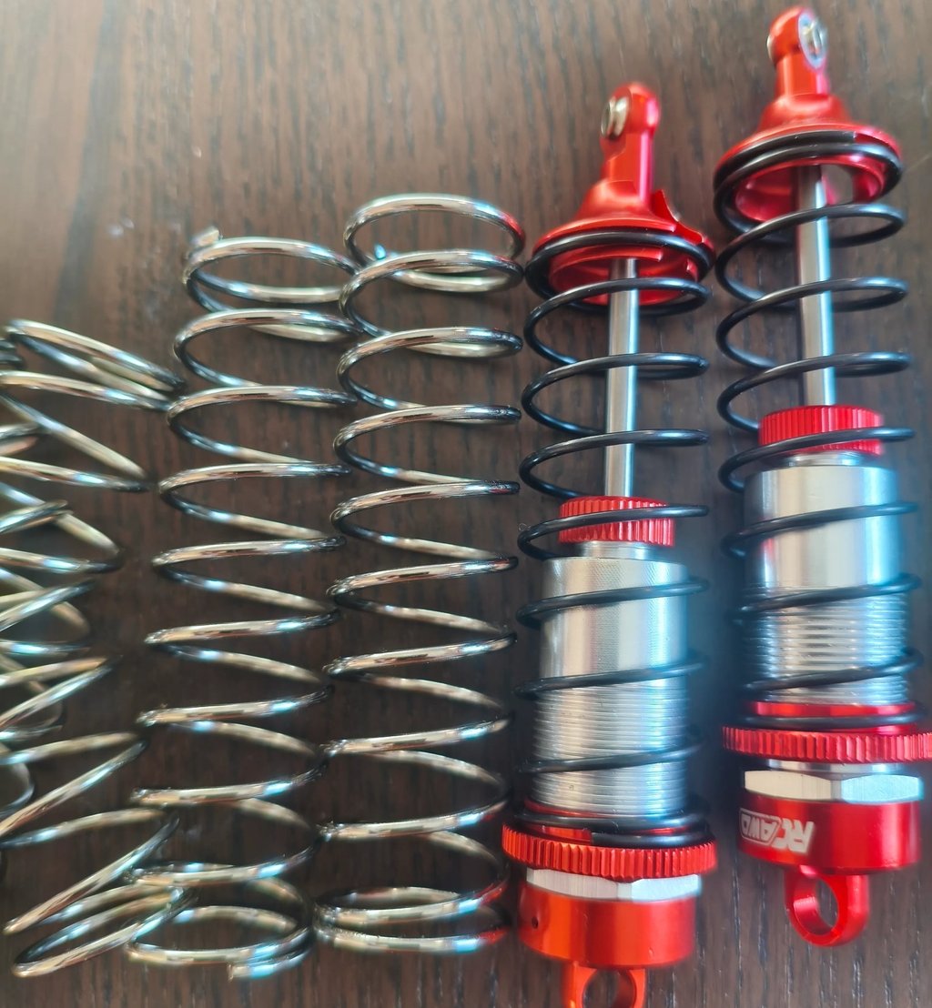 Sistema de suspensão RC com amortecedores e molas em metal