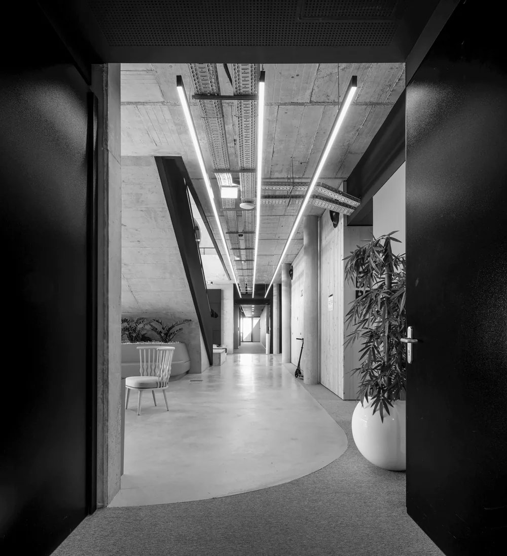 Modern office corridor representing strategic growth for technical B2B companies.