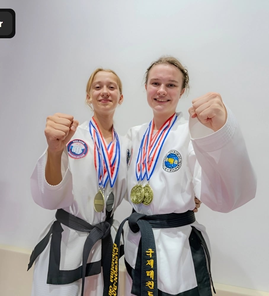 Hwa Rang Taekwon-Do students Dubai with competition medals showing courtesy and sportsmanship