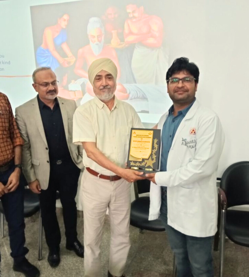 Best plastic surgeon in Udaipur Dr. Bharat Agarwal receiving 1st prize in plastic surgery