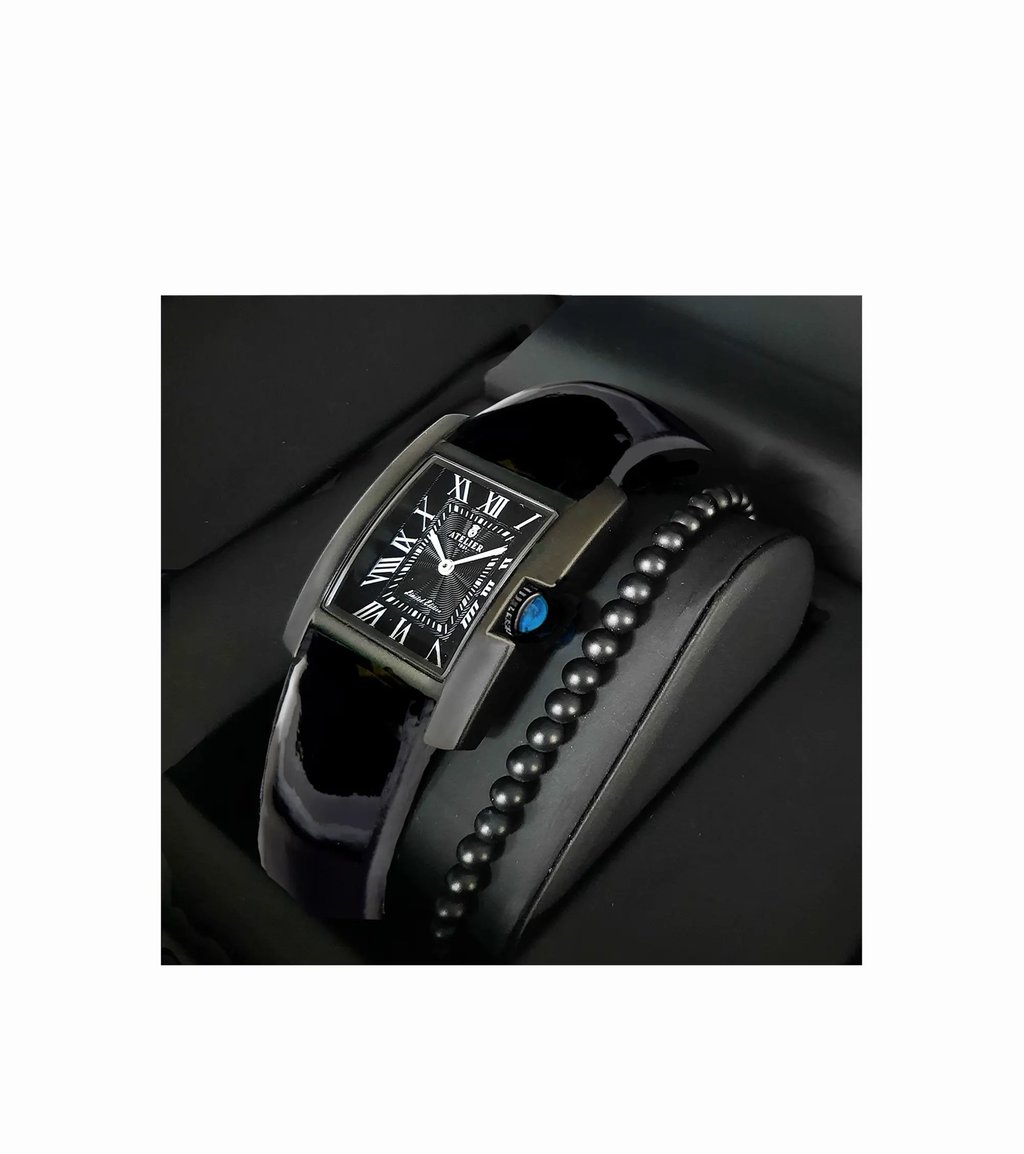 Luxury black tank watch with Roman numerals and matching beaded bracelet in a gift box.