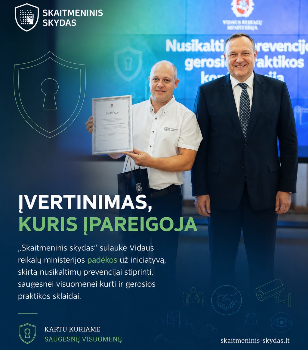 Two men posing with a Skaitmeninis Skydas award from the Ministry of the Interior for crime prevention.