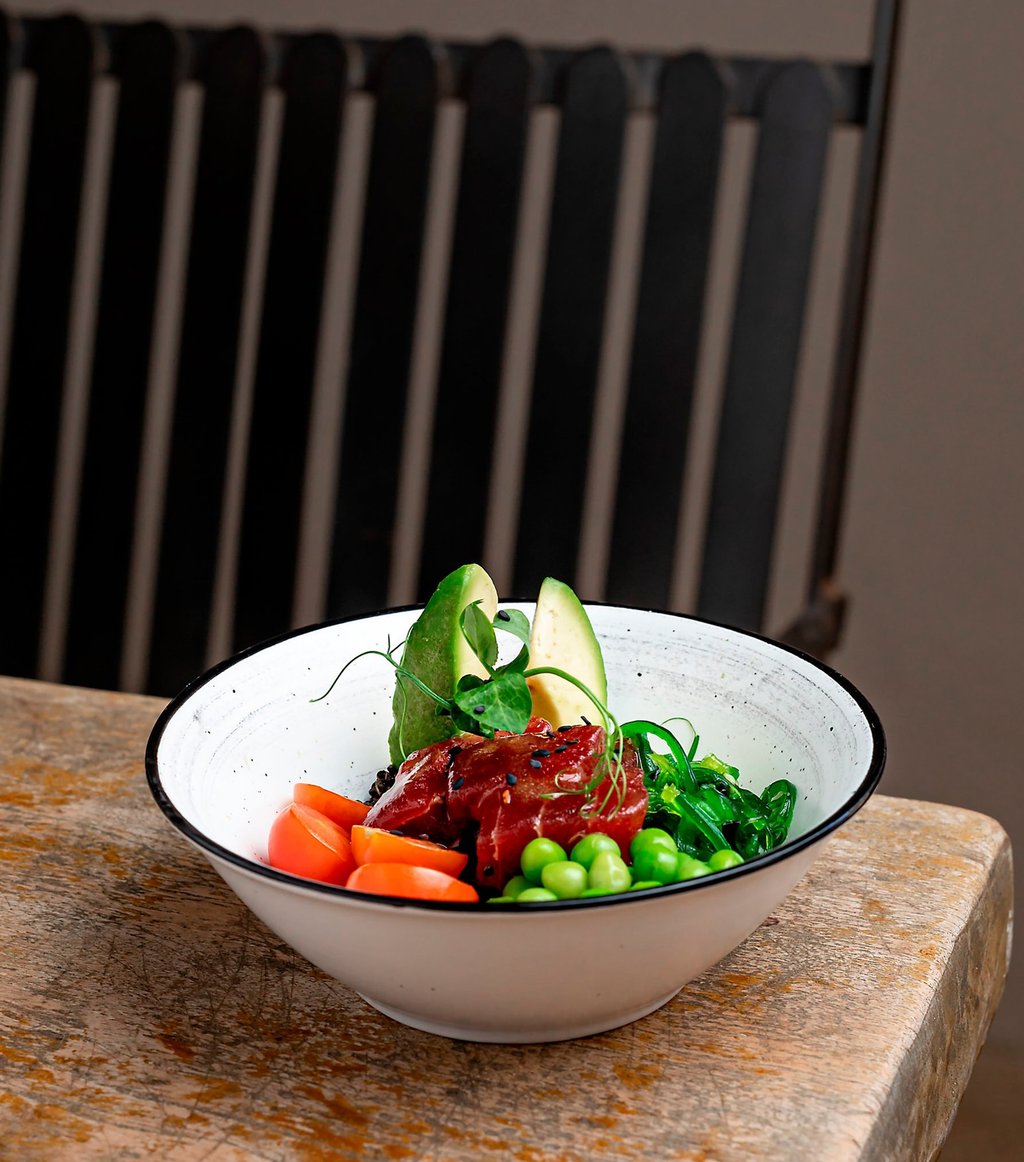 a bowl of food with vegetables and vegetables