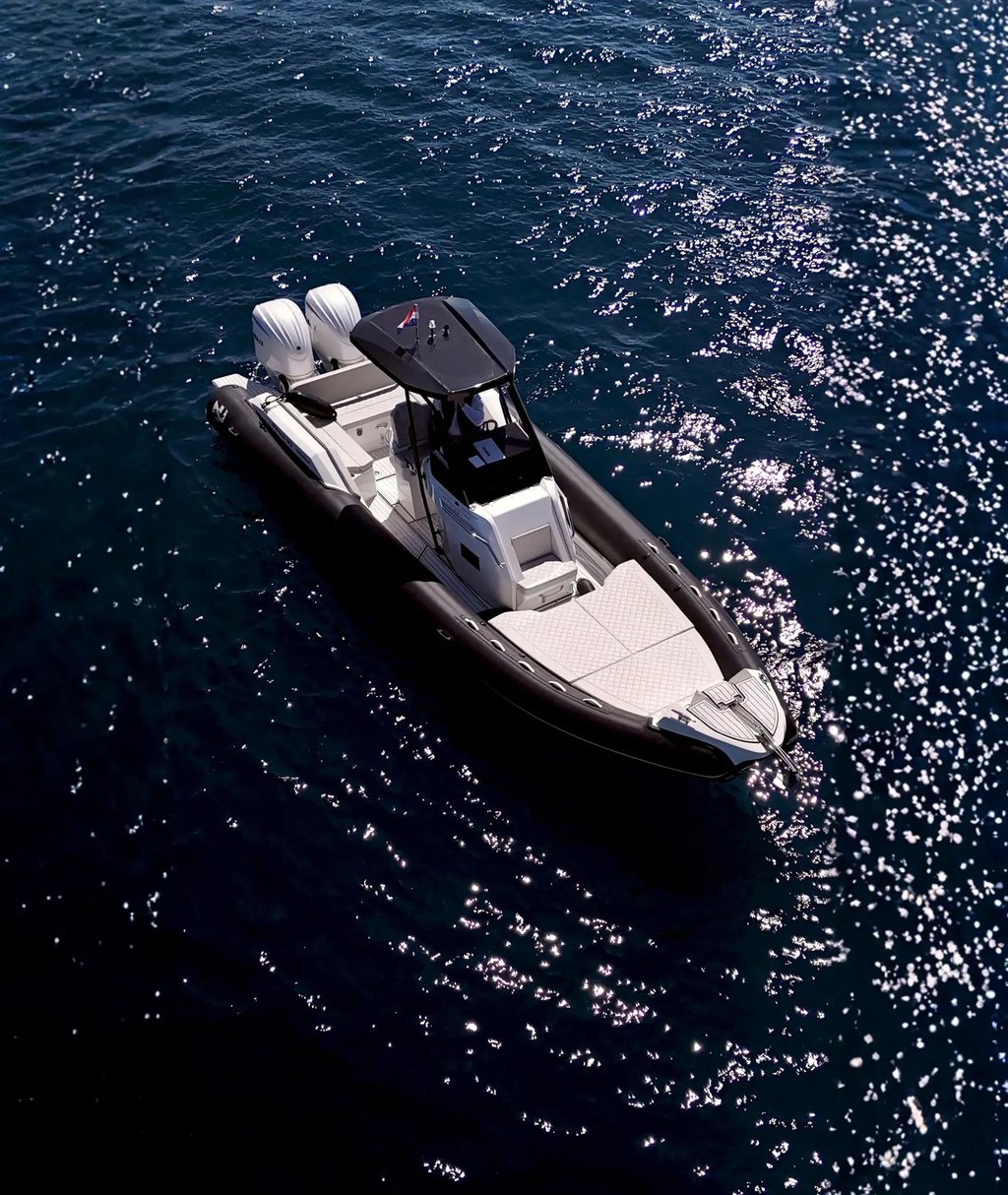 Aerial view of Nuova Jolly Prince 30 Exclusive boat ready for a private transfer from Split