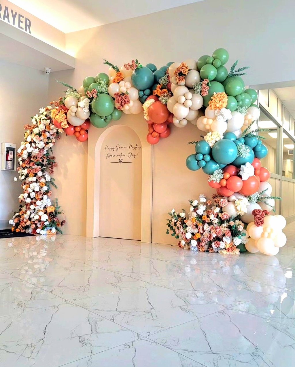 Balloon garland + floral package rental