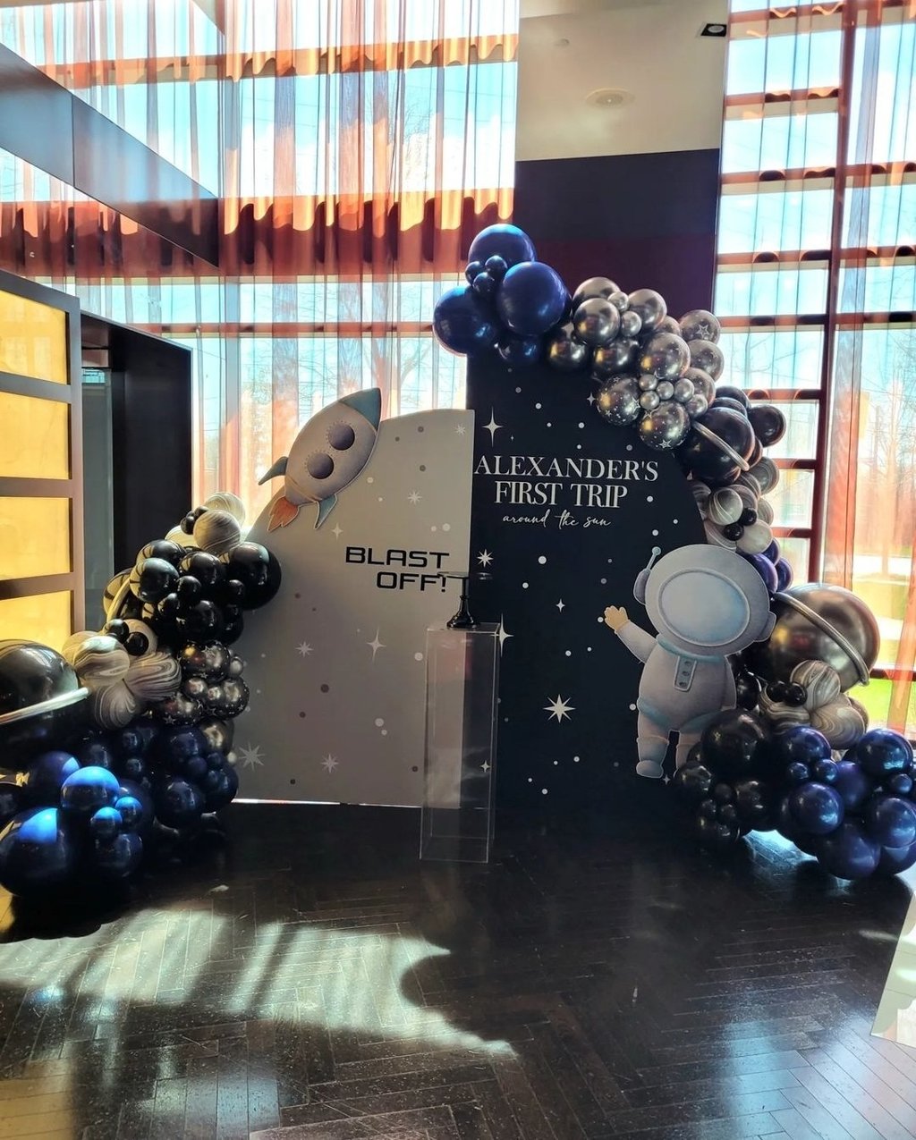 First trip Space themed balloon backdrop rental
