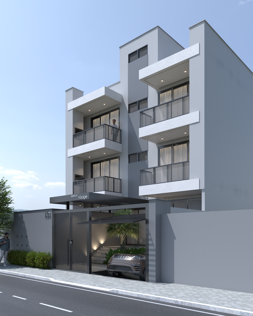 a modern apartment building with a car parked in front of it