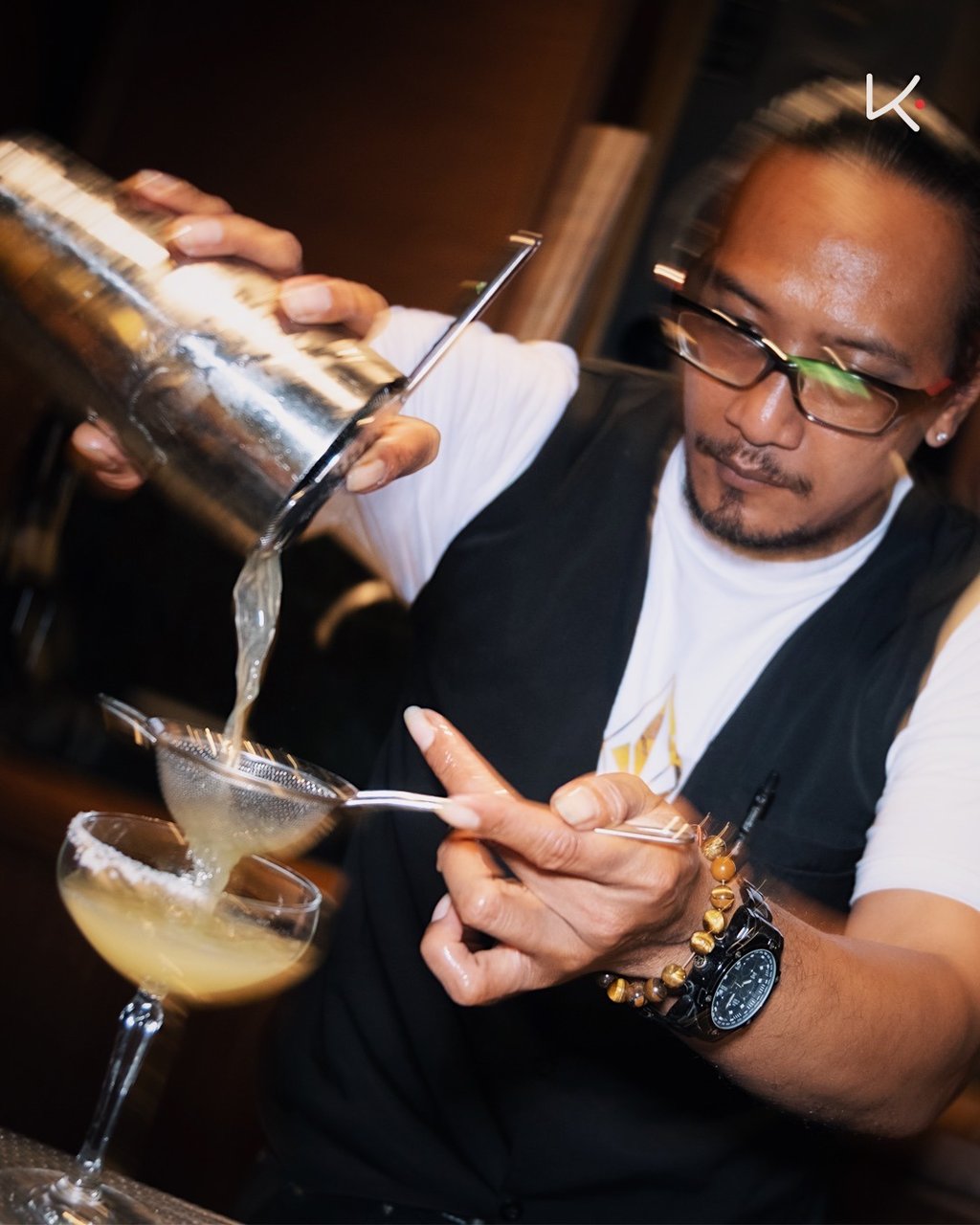Kenji Ramen Bali vibrant evening atmosphere - izakaya dining with music and entertainment