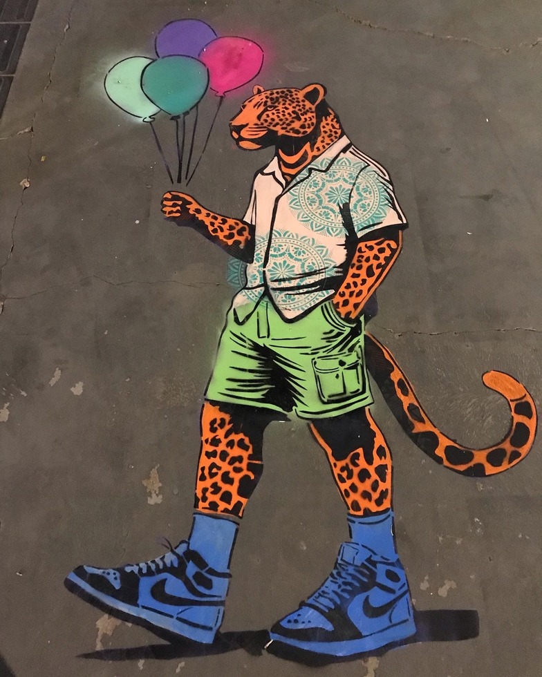 Imagem de um graffiti feito por Sérgio Astral, titulo mano onça