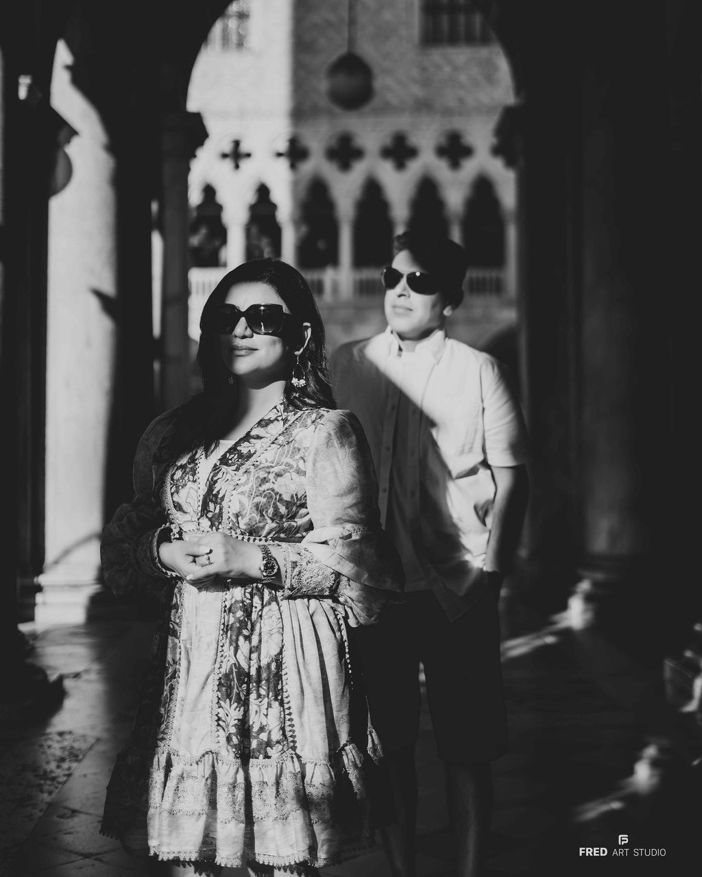 Black and white couple street photo in Venice