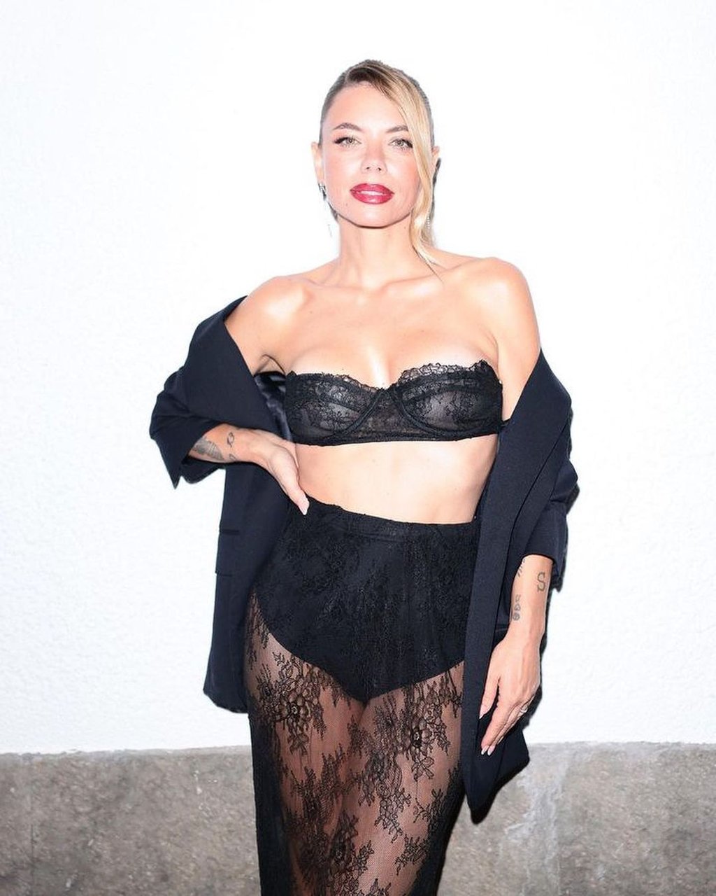 Portuguese influencer Mel Joardao on a red carpet for VOGUE