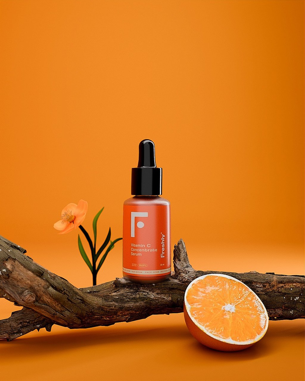 Bote de vitamina c de la marca Freshly, encima de un tronco con una flor al lado y un trozo de naranja.
