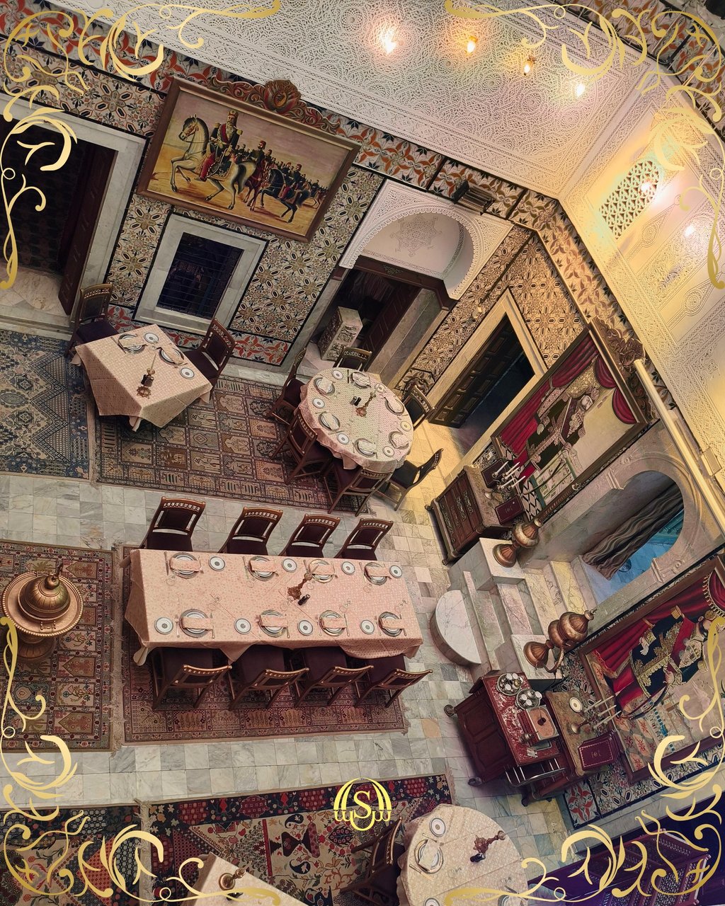 a dining room with a table set for a dinner dans le palais historique Tunis Essaraya.