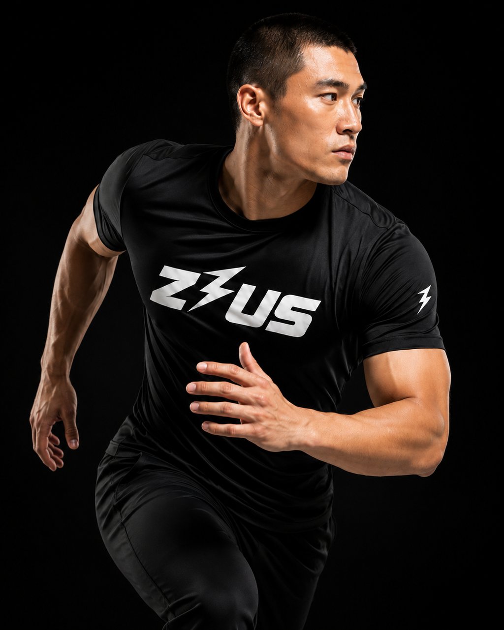 Male athlete sprinting in a black Zeus workout shirt, showcasing lightweight activewear NZ.