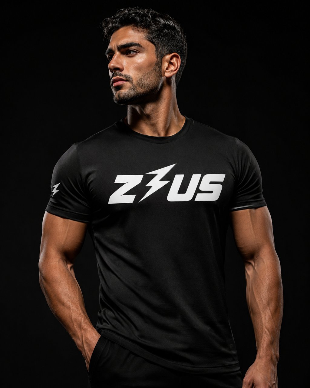 Male model in black Zeus workout shirt on black background showing stylish men's activewear NZ.
