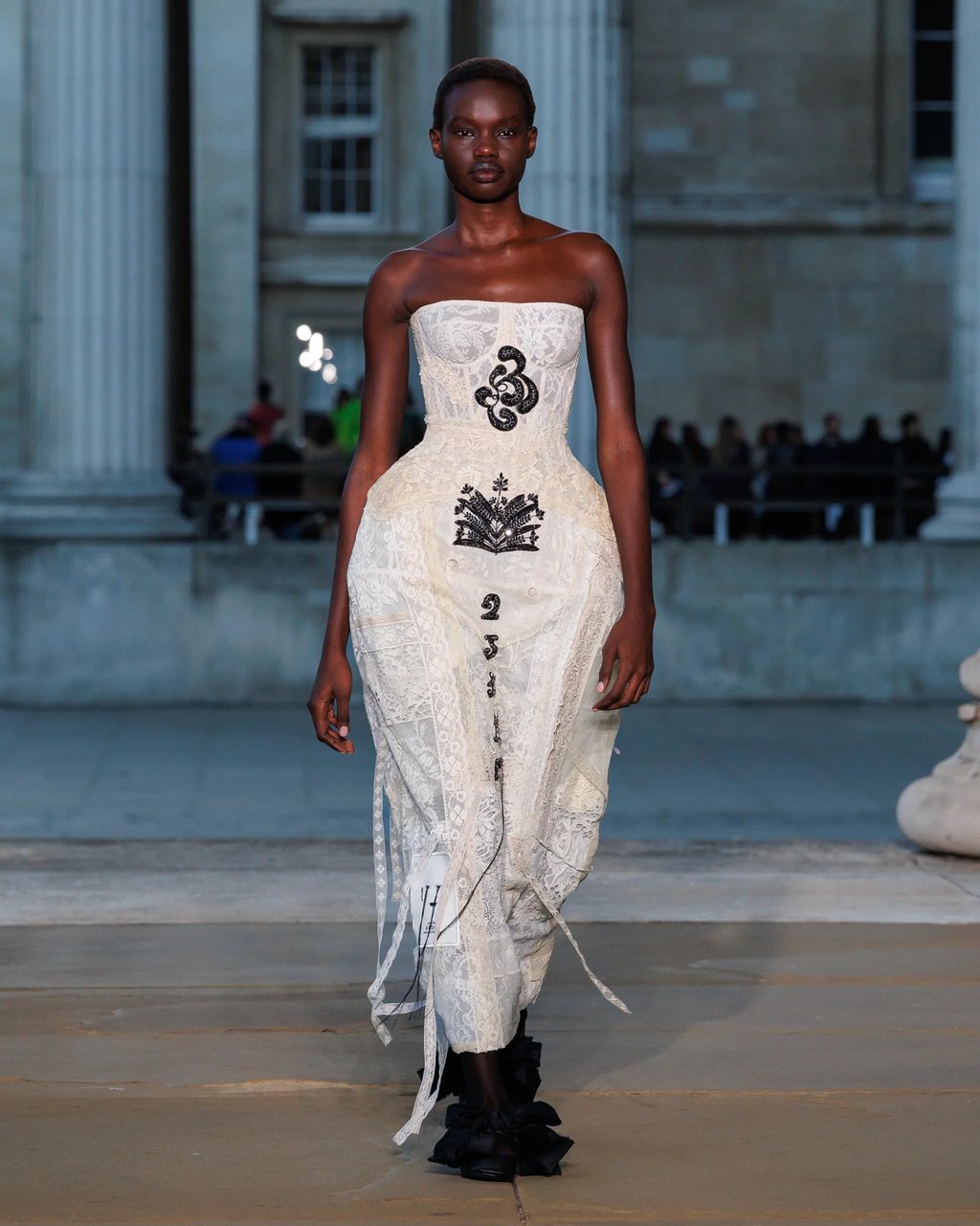 a woman in a white dress with from ERDEM spring summer 2026