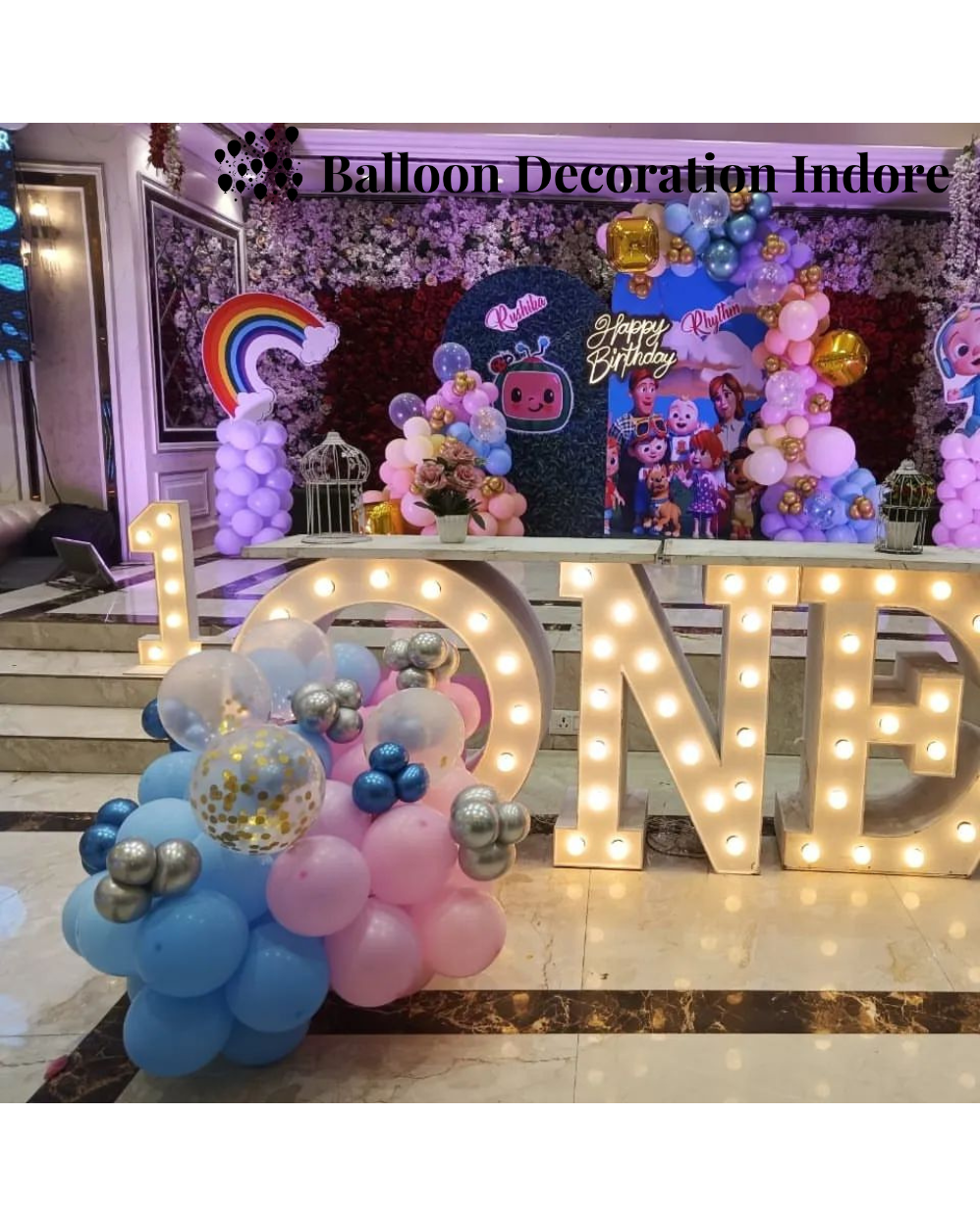 a balloon - shaped sign with balloons and balloons