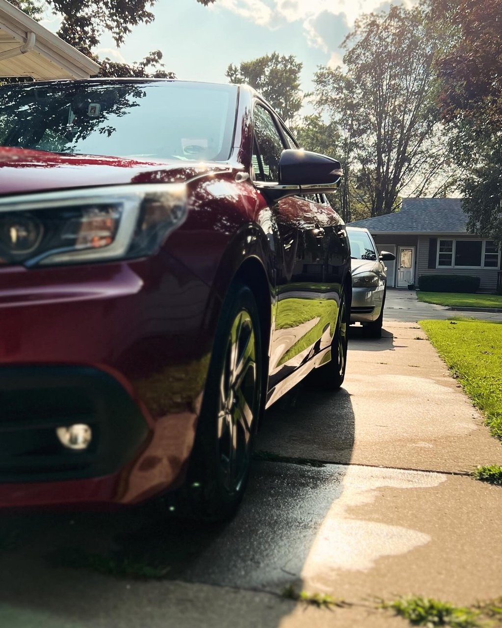 Professional mobile car wash removing grime and restoring a car’s shine