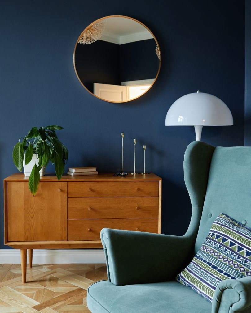 moody dark blue living room