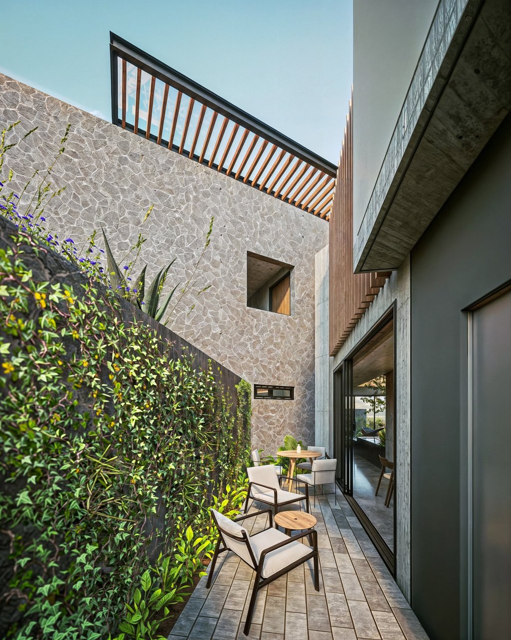 terraza de casa con materiales de piedra, concreto y piedra