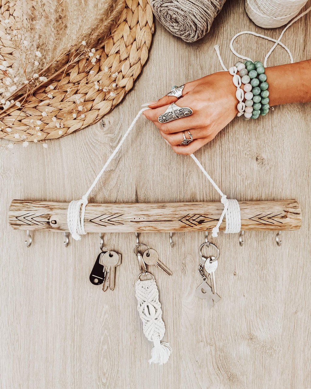 boho girl hand holding key organizer