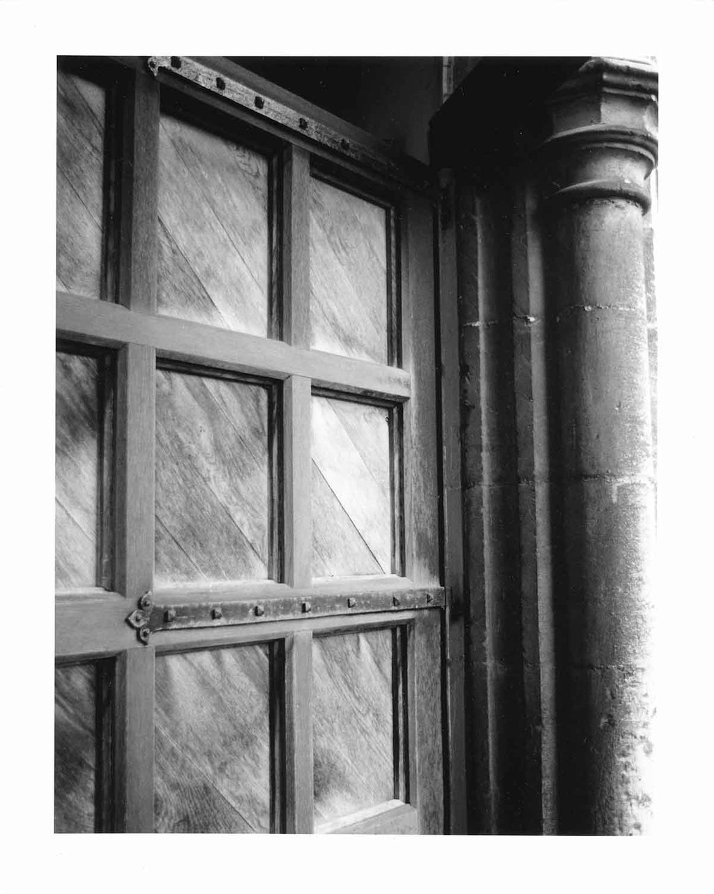 Wooden entrance door to the historical building, Architecture photography. Creator: Slawek Dejneka