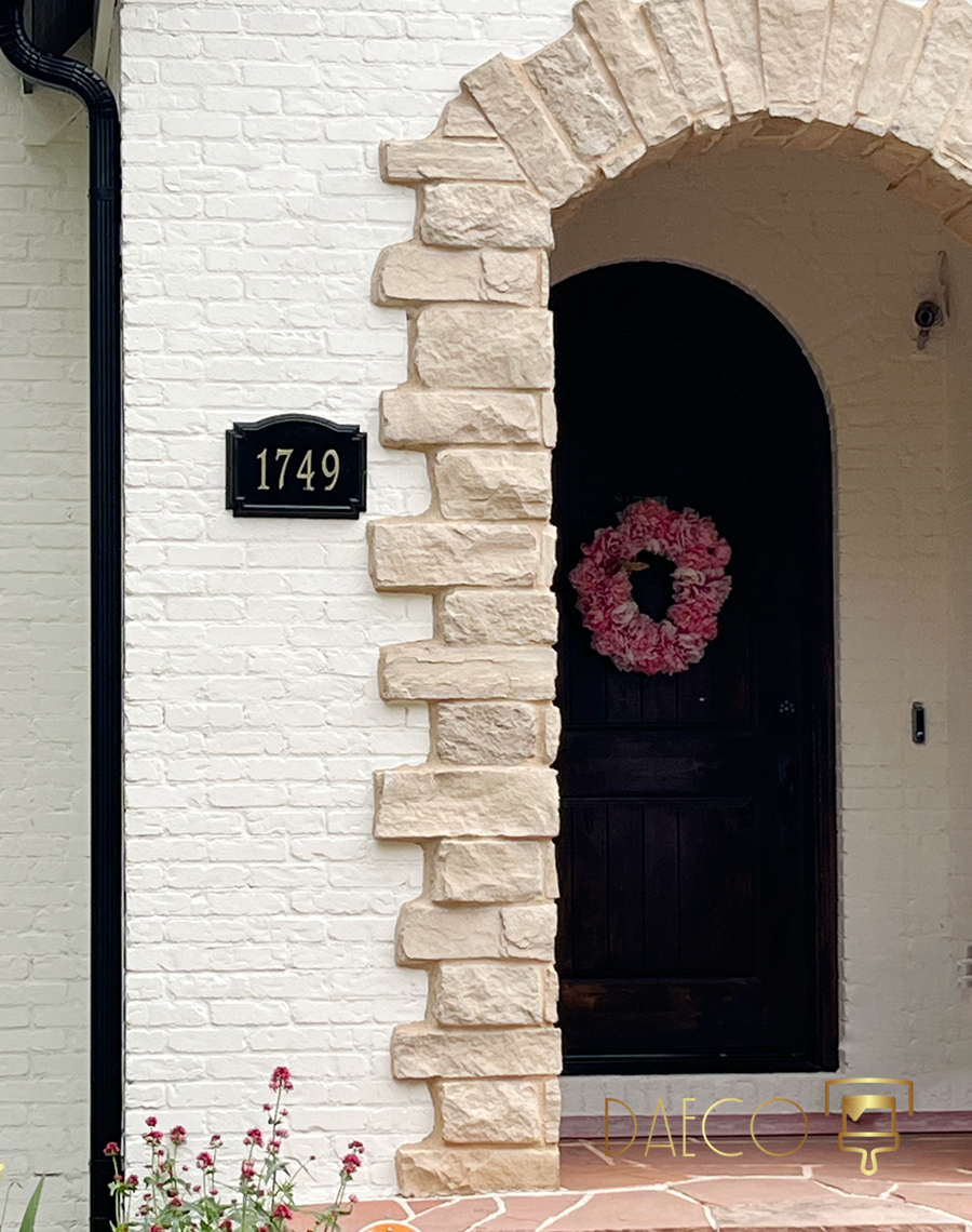 Exterior painting detail of a home in Washington Park, Denver. Features crisp white painted brick c