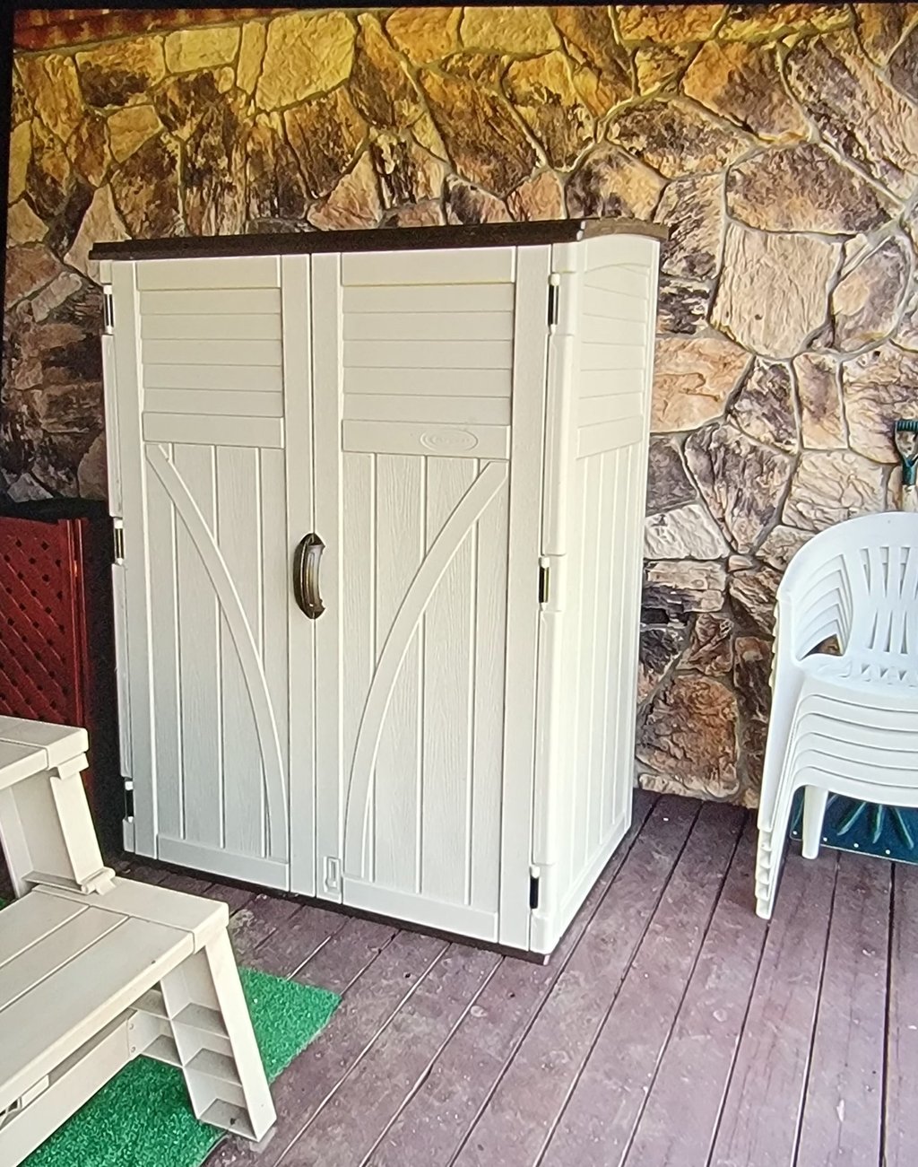 Storage shed assembled from a kit